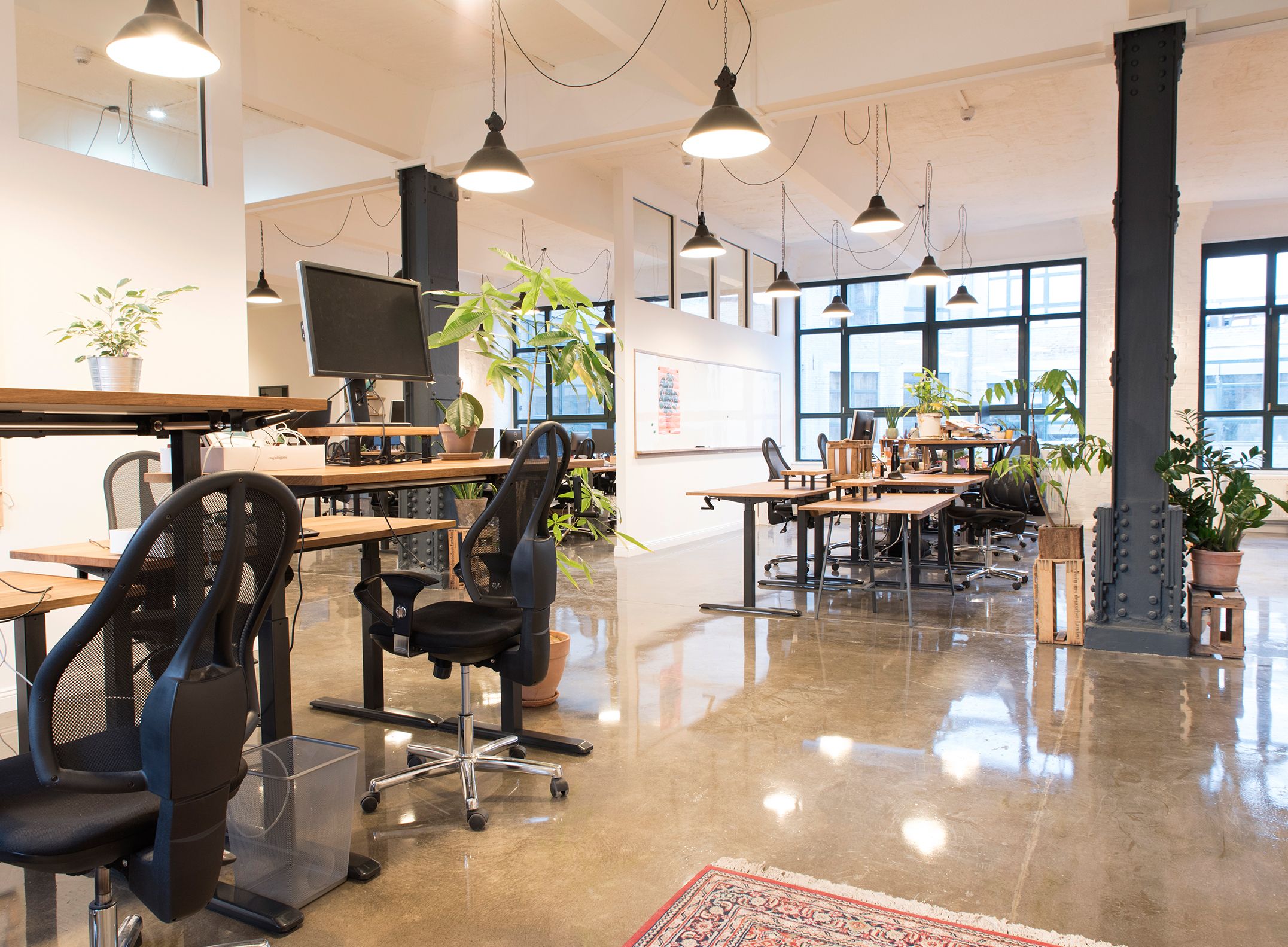 The office is large, spacious and bright with industrial design